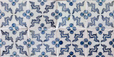 Eight tiles: four across, two deep. All the tiles have an identical pattern. The pattern repeats at the intersections.